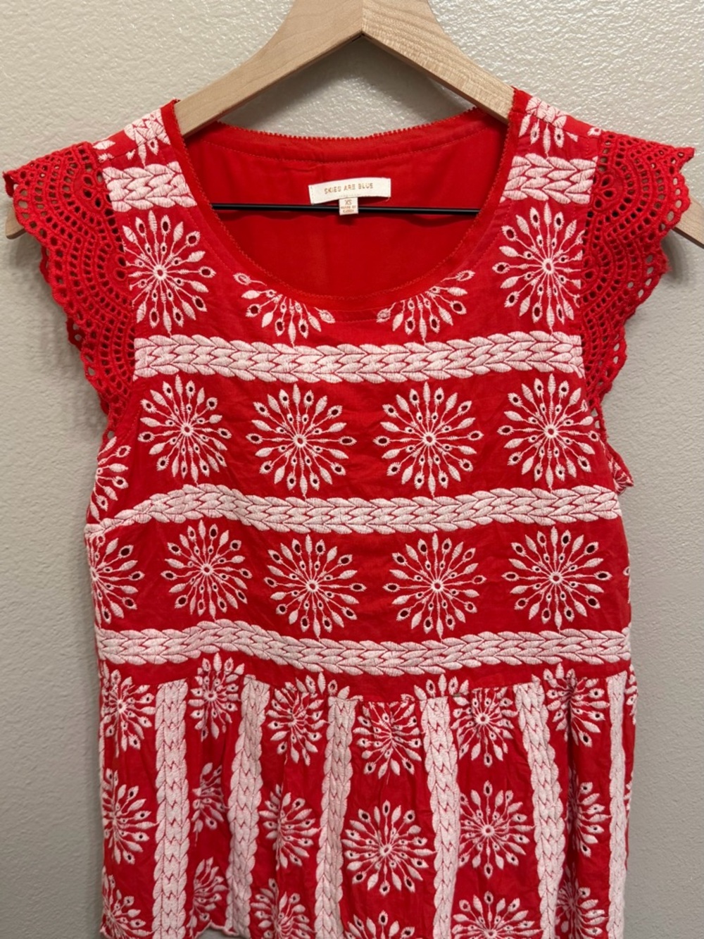 Skies Are Blue Red Top with White Embroidery